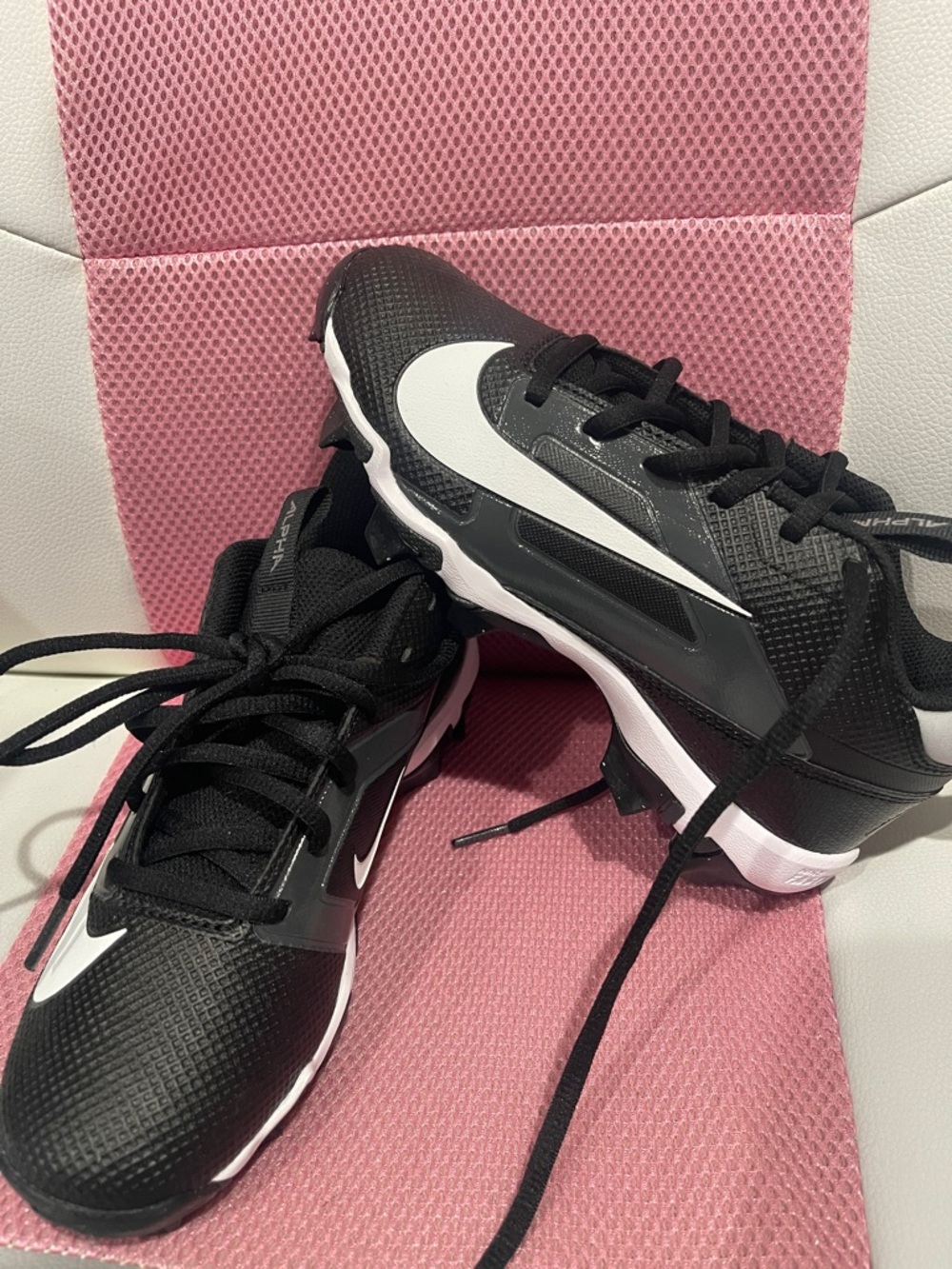 Kid’s Nike Black and White Sport Cleats with Bold Swoosh size 3.5Y